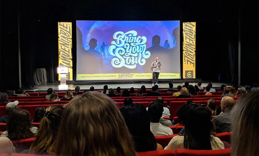 Josh Horton speaking at Creative Works conference, 2018.